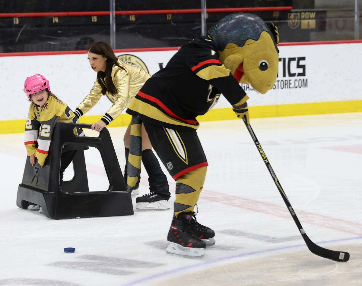 Former UMC Children’s Hospital patient Trinity Jacaruso, 5, rides around the ice during ...