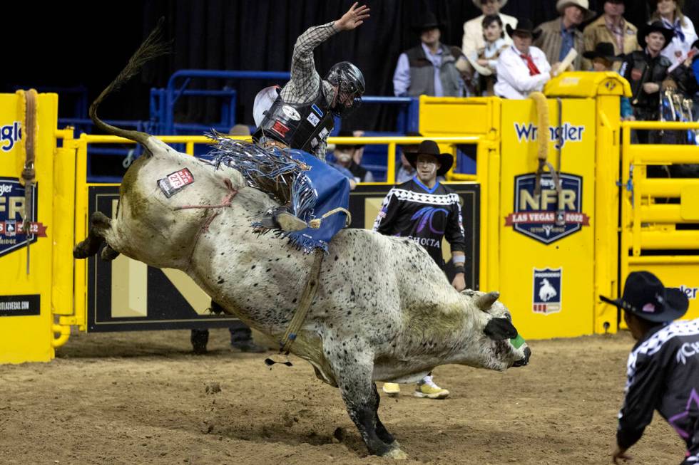 Tristen Hutchings, of Monteview, Idaho, competes in bull riding during the sixth go-round of th ...