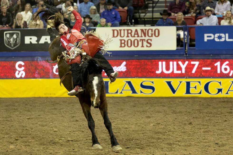 Rocker Steiner, of Weatherford, Tex., competes in bareback riding during the sixth go-round of ...