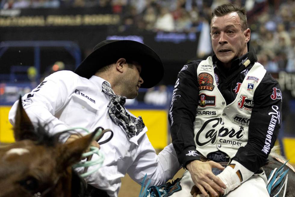 Tim O’Connell, of Zwingle, Iowa, competes in bareback riding during the sixth go-round o ...