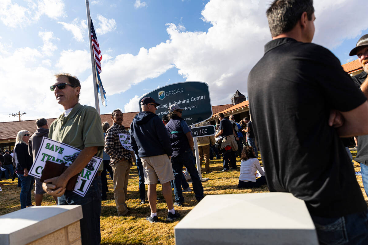 People arrive for an open house public meeting for the Sustainable Low Water Access Plan of Lak ...