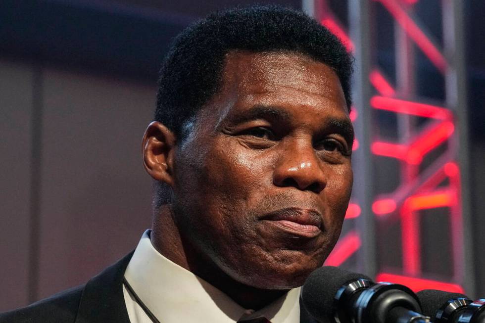 Republican Senate challenger Herschel Walker speaks during an election night watch party, Tuesd ...