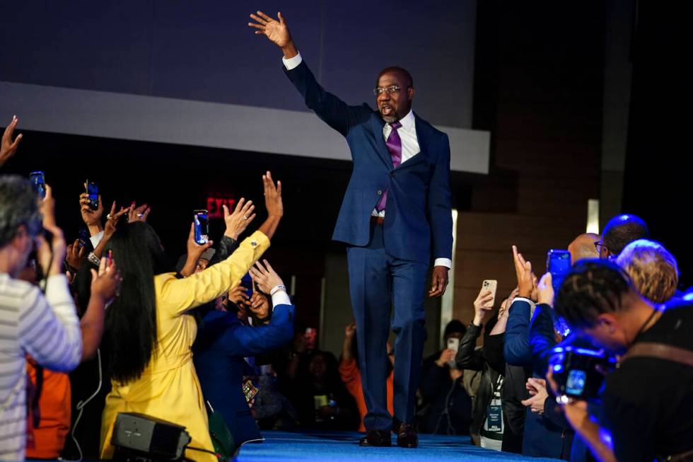 Democratic Sen. Raphael Warnock speaks during an election night watch party, Tuesday, Dec. 6, 2 ...