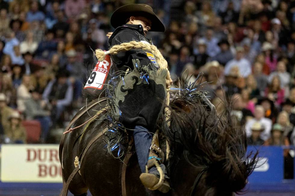 Zeke Thurston, of Big Valley, Alberta, Canada, competes in saddle bronc riding during the eight ...