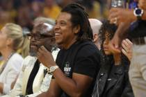 Jay-Z watches during the first half of Game 5 of basketball's NBA Finals between the Golden Sta ...