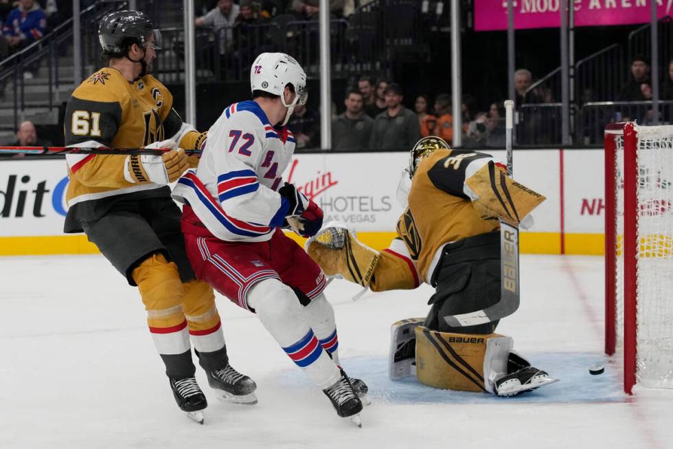 New York Rangers center Filip Chytil (72) scores on Vegas Golden Knights goaltender Logan Thomp ...