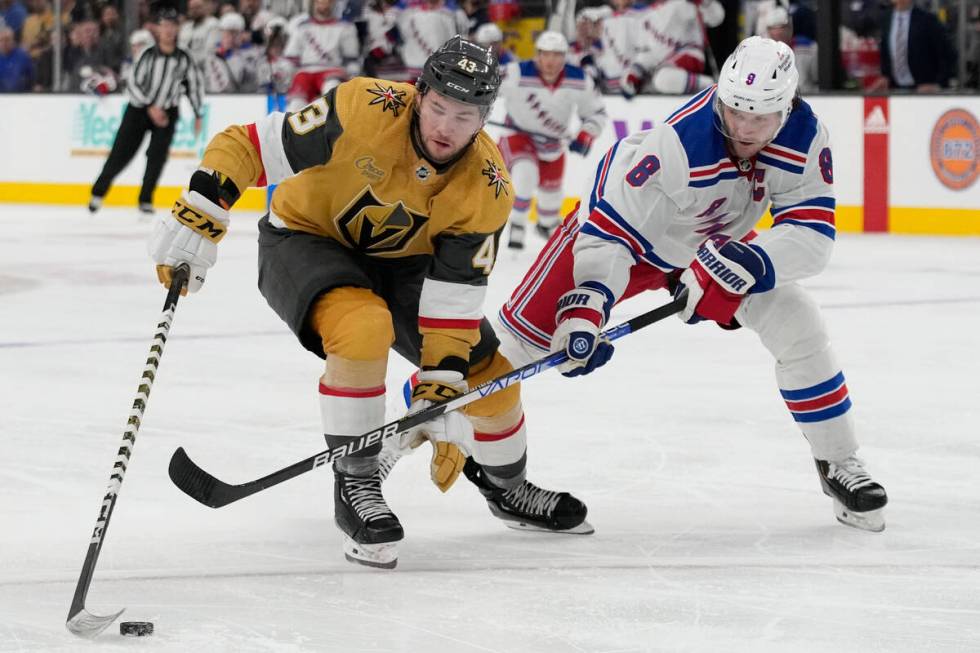 Vegas Golden Knights center Paul Cotter (43) skates around New York Rangers defenseman Jacob Tr ...