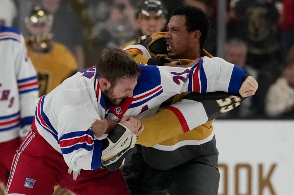 New York Rangers center Barclay Goodrow (21) and Vegas Golden Knights right wing Keegan Kolesar ...