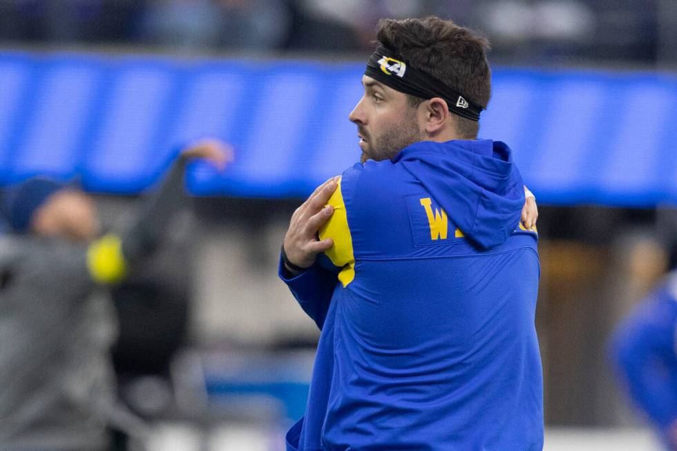 Los Angeles Rams quarterback Baker Mayfield (17) stretches before an NFL game against the Raide ...