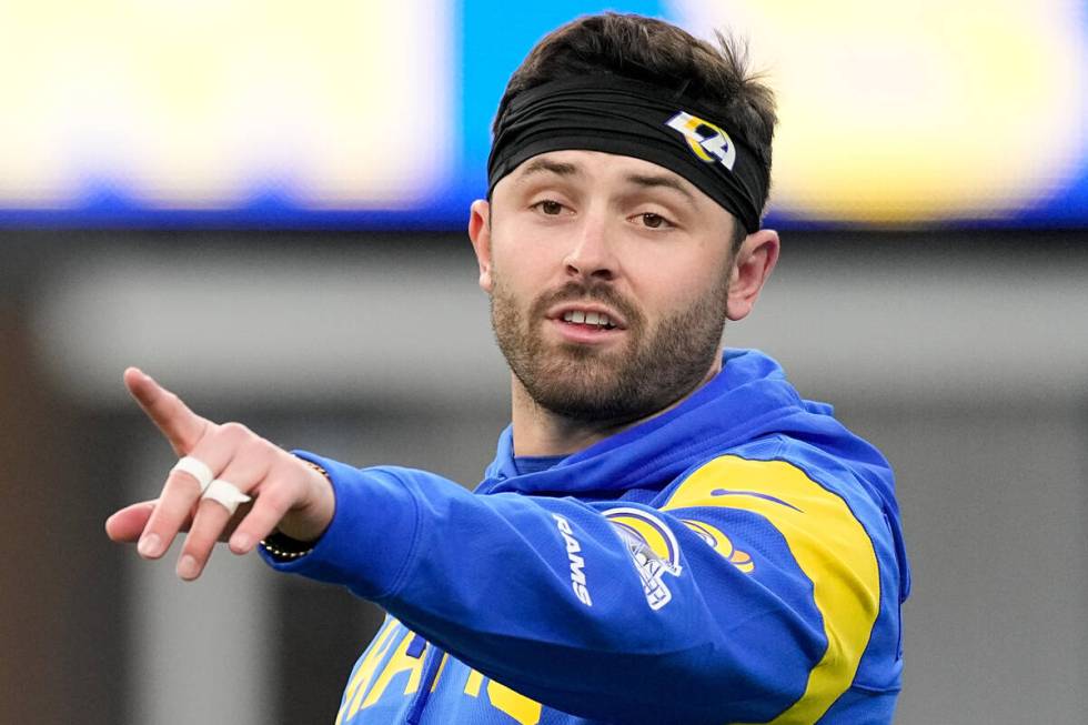 Los Angeles Rams quarterback Baker Mayfield warms up before an NFL football game against the Lo ...