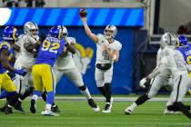 Las Vegas Raiders quarterback Derek Carr throws a pass during the second half of an NFL footbal ...