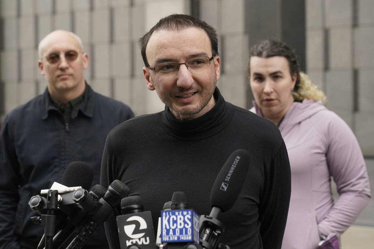 Former Twitter employee Manu Cornet, foreground, speaks in front of Dmitry Borodaenko, rear lef ...