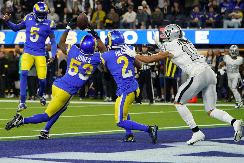 Los Angeles Rams linebacker Ernest Jones (53) makes an interception in the end zone during the ...