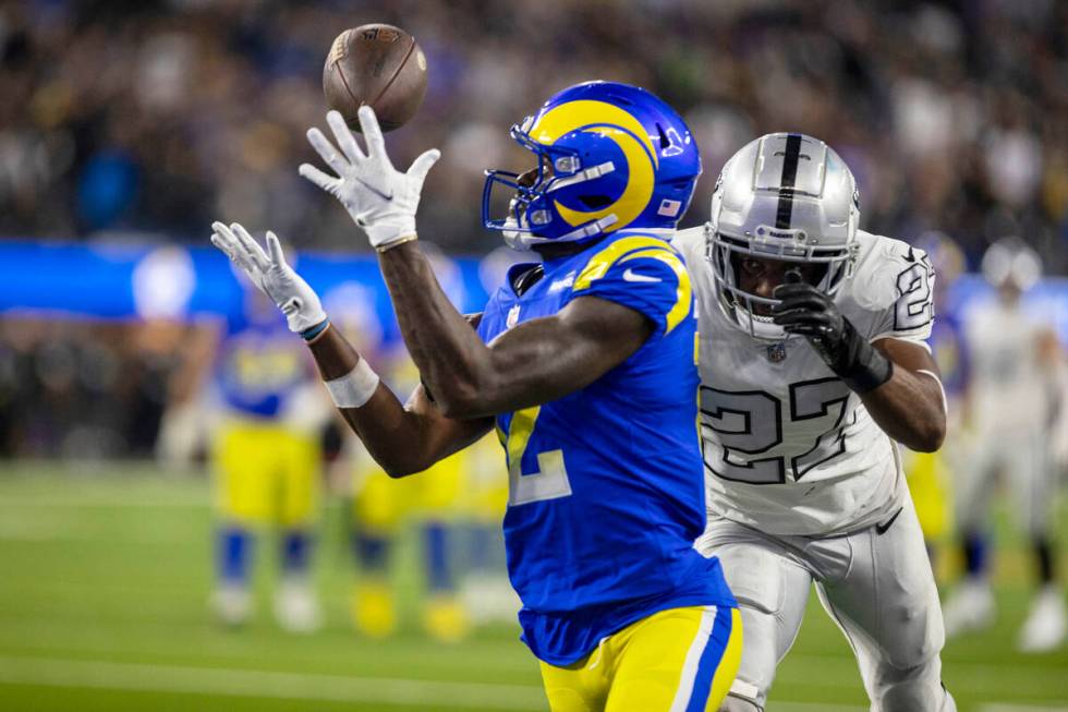 Los Angeles Rams wide receiver Van Jefferson (12) scores the game-tying touchdown over Raiders ...