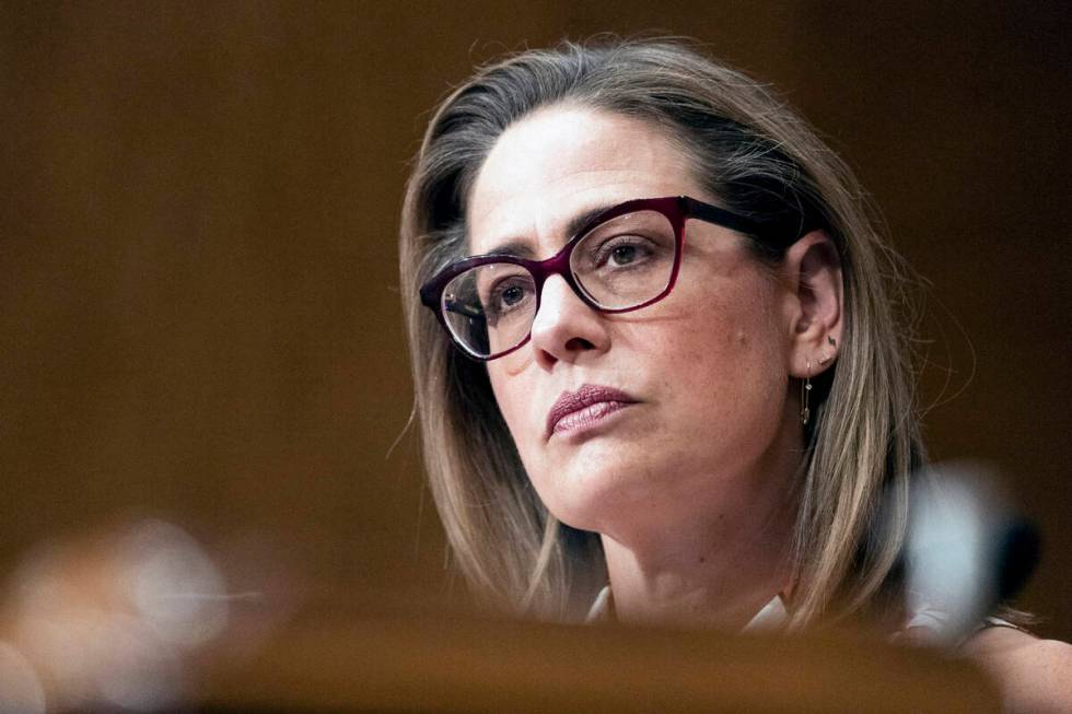 FILE - Sen. Kyrsten Sinema, D-Ariz., speaks during a Senate Homeland Security and Governmental ...