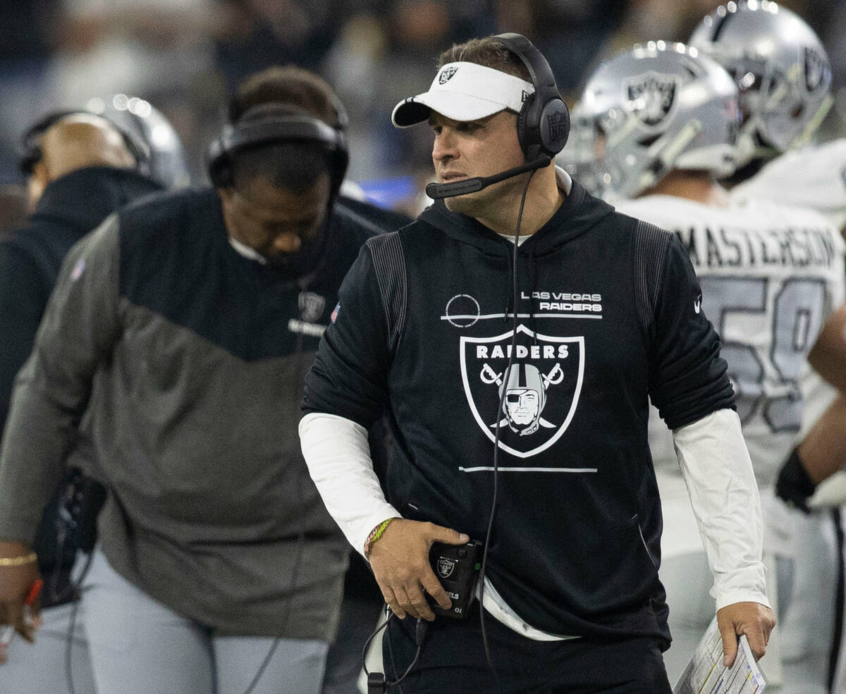 Raiders head coach Josh McDaniels looks on from the sideline during the second half of an NFL g ...