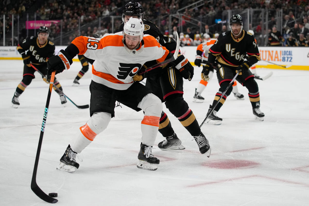 Philadelphia Flyers center Kevin Hayes (13) skates around Vegas Golden Knights defenseman Shea ...