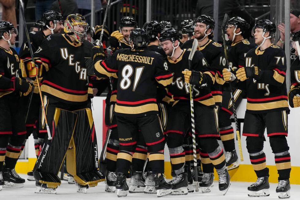 Vegas Golden Knights celebrate after Vegas Golden Knights center Jonathan Marchessault (81) sco ...