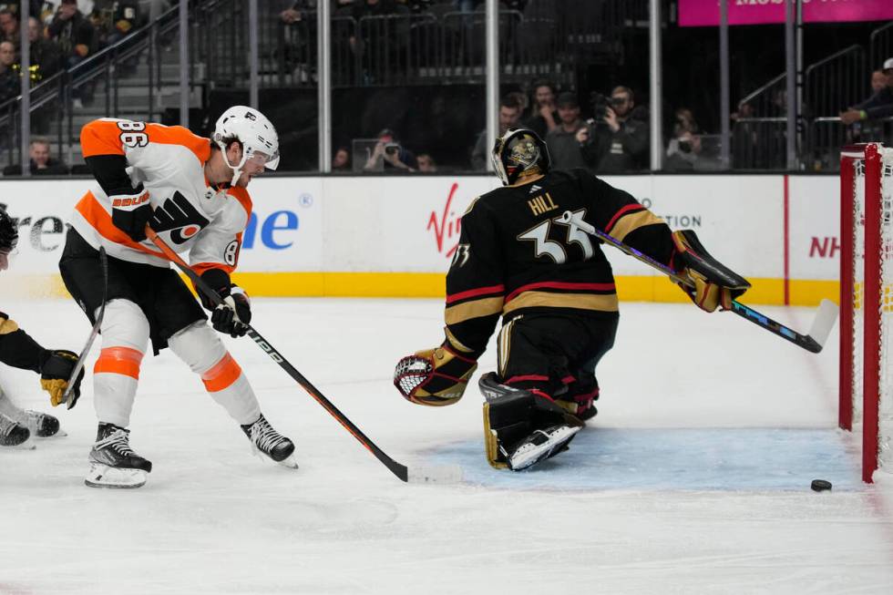 Philadelphia Flyers left wing Joel Farabee (86) misses an attempted shot on Vegas Golden Knight ...