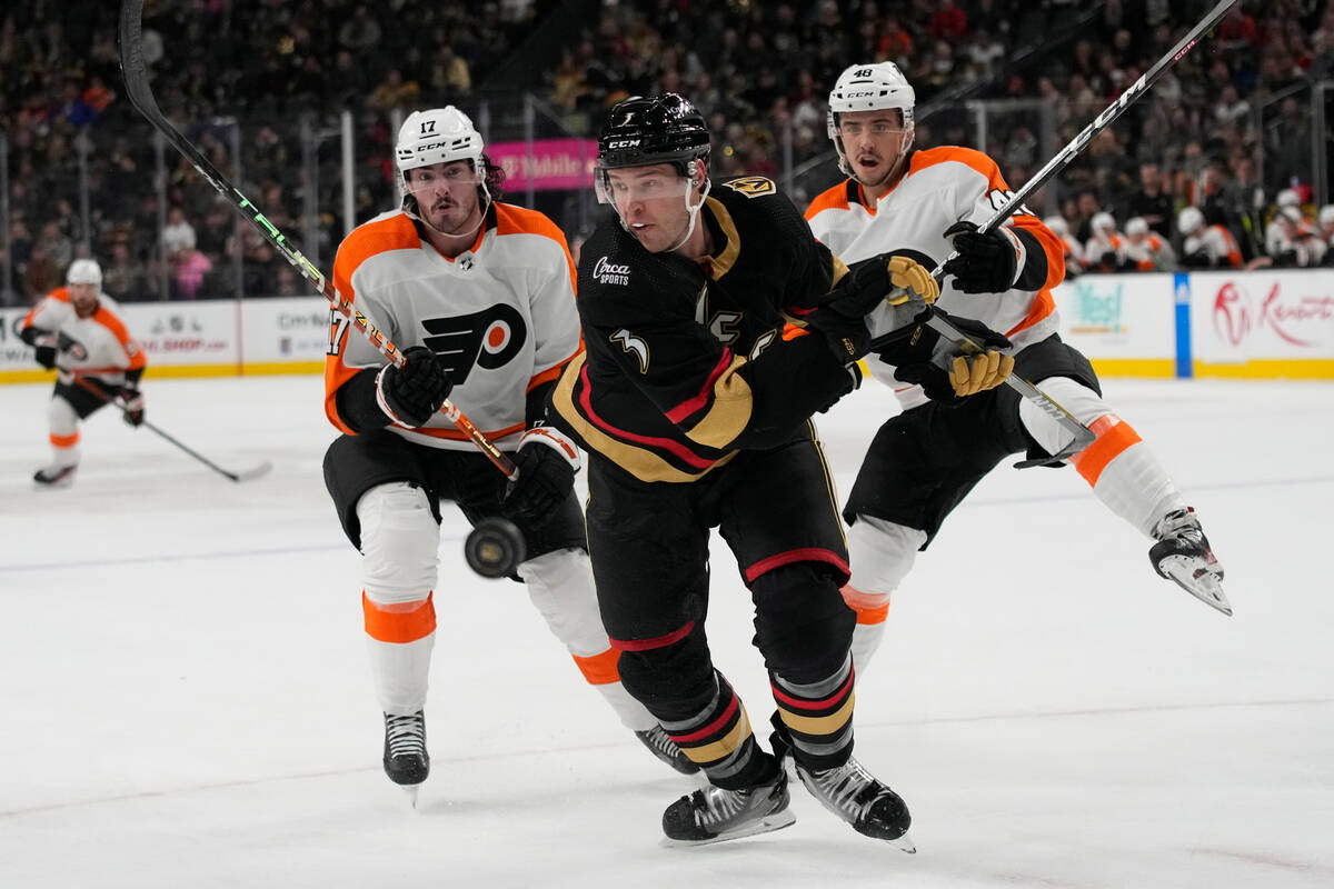 Philadelphia Flyers center Zack MacEwen (17), and Philadelphia Flyers center Morgan Frost (48) ...