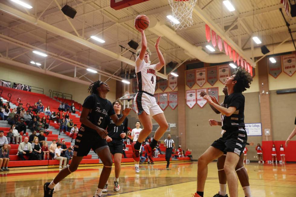 Arbor View's Jalen Dickel (4) takes a shot against Shadow Ridge during a boy's basketball game ...