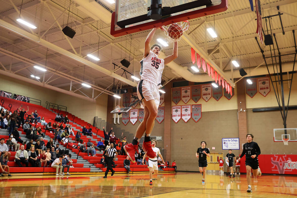 Arbor View's Wyatt Jaeck (35) dunks the ball for a score during a boy's basketball game against ...