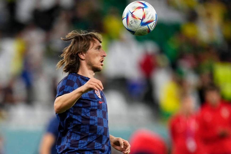 Croatia's Luka Modric warms up prior to the World Cup quarterfinal soccer match between Croatia ...