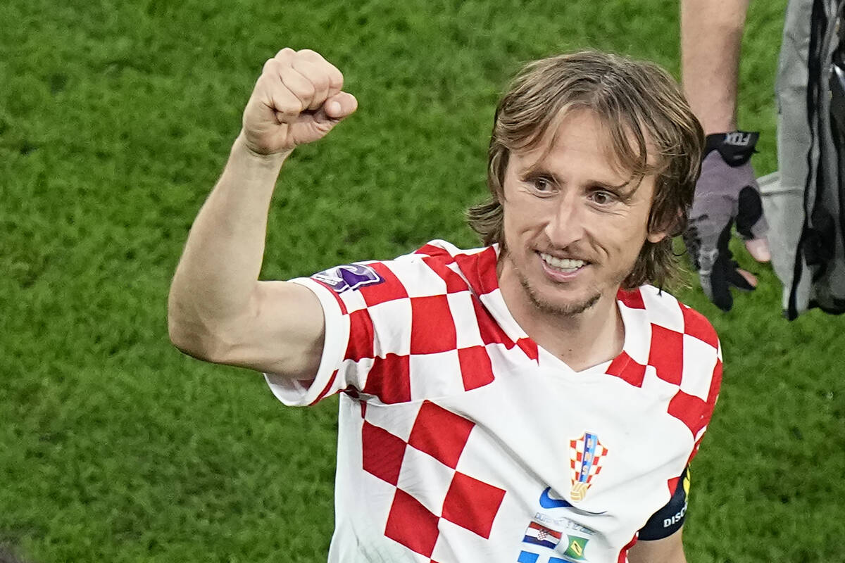 Croatia's Luka Modric celebrates after the World Cup quarterfinal soccer match between Croatia ...