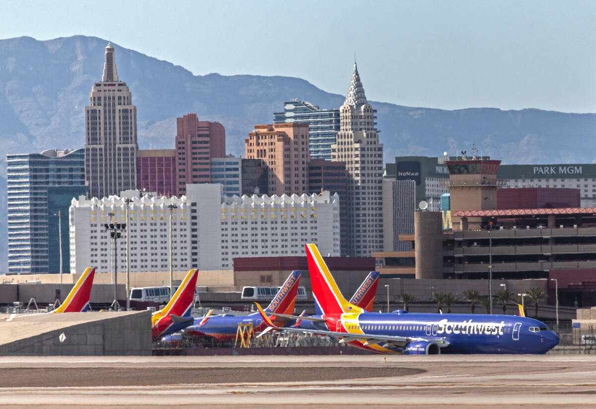 A Southwest plane taxis to its gate at McCarran International Airport on Tuesday, March 31, 202 ...