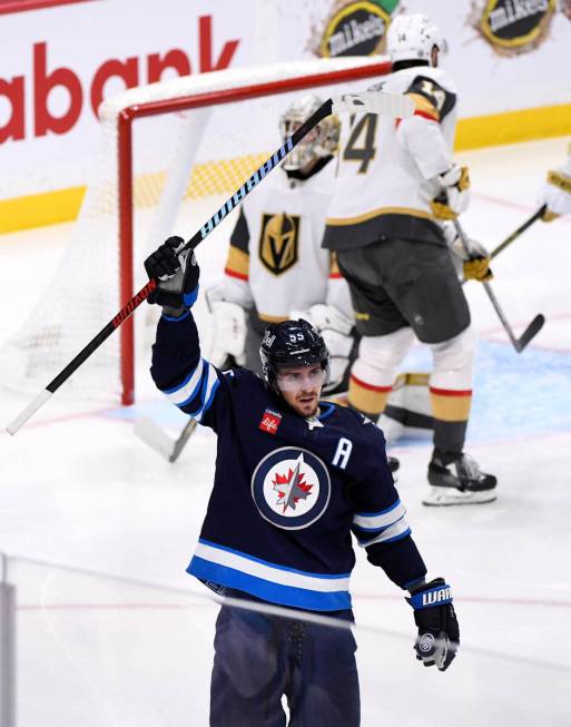 Winnipeg Jets' Mark Scheifele (55) celebrates his goal against the Vegas Golden Knights during ...