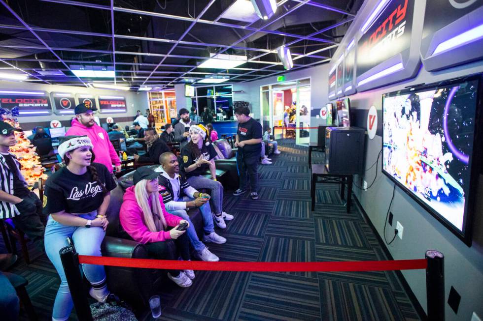 Members of esports team Las Vegas Inferno play Super Smash Bros. Ultimate during a party at Vel ...