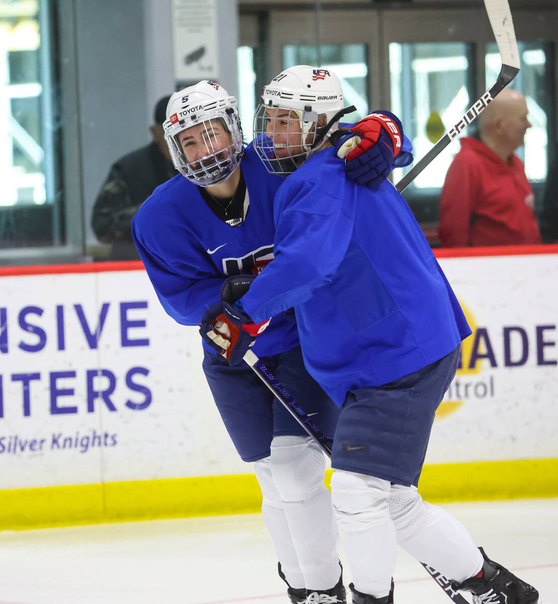 Megan Keller (5) and Hilary Knight (21) of the U.S women's national hockey team embrace at Life ...