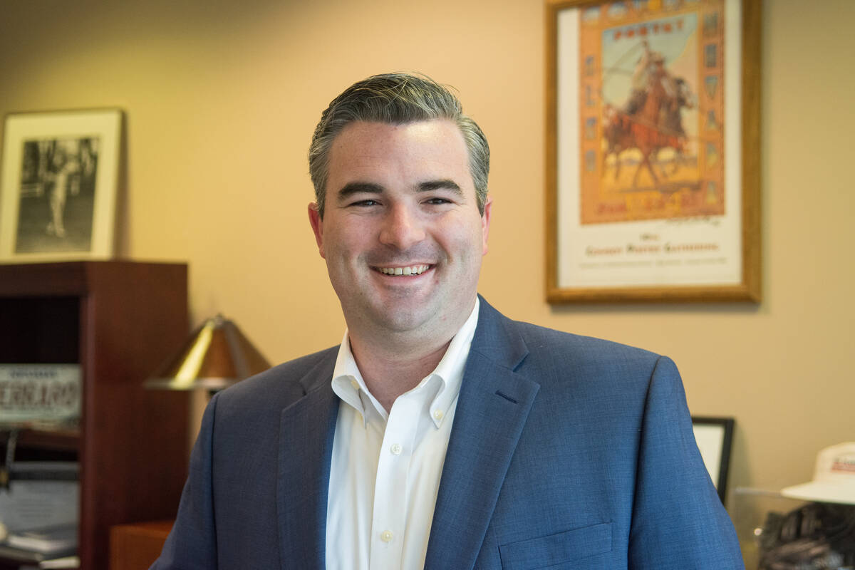 Tommy Ferraro, director of public affairs for The Ferraro Group poses for a portrait on Dec. 5, ...