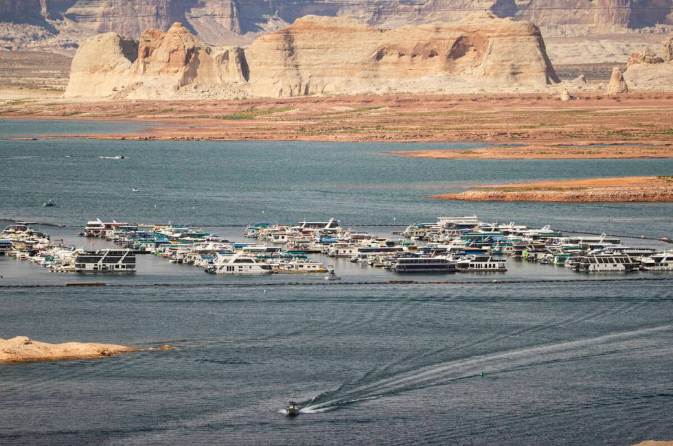 FILE - Boats and other watercraft are pictured near the Wahweap Marina at Lake Powell in the Gl ...