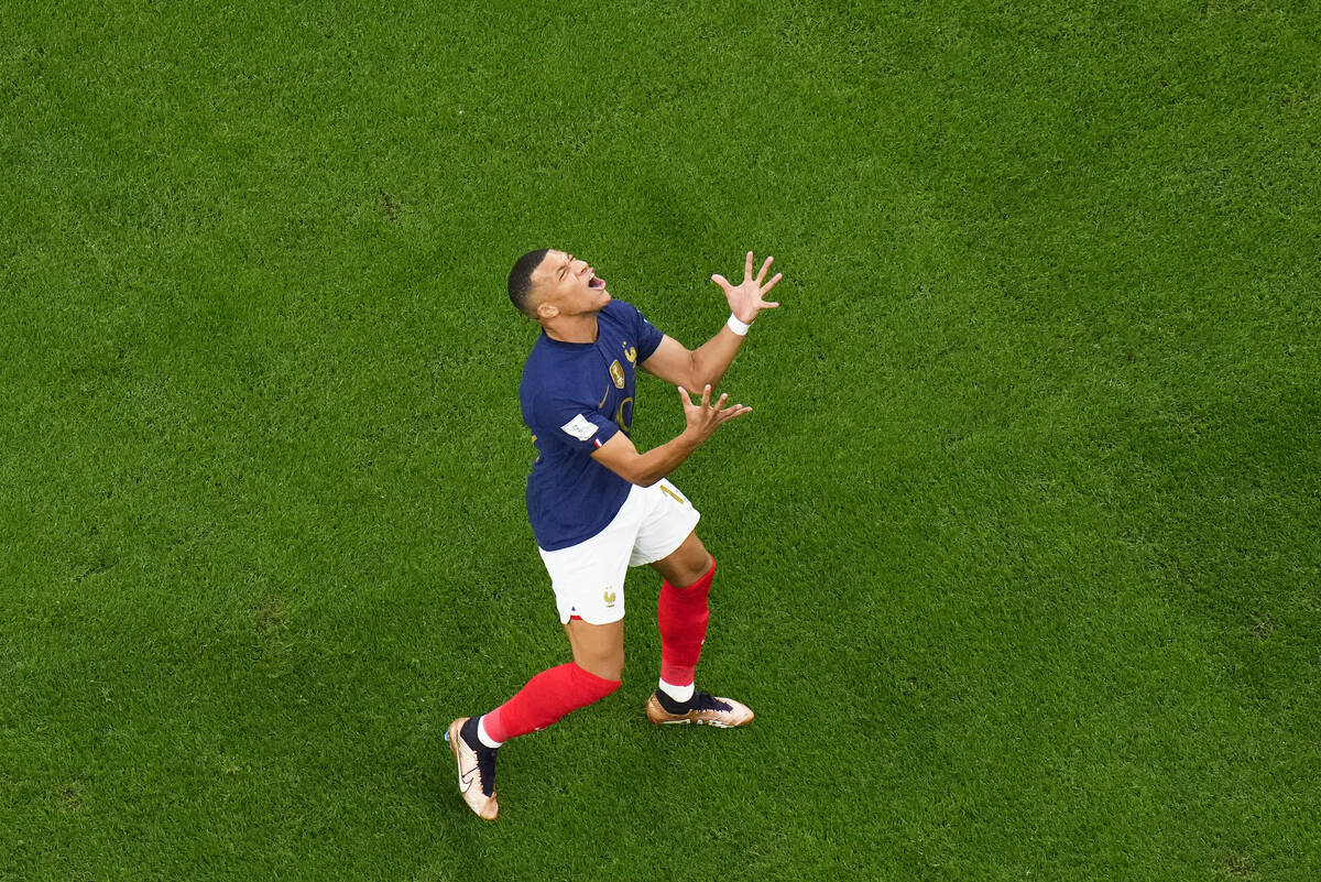 France's Kylian Mbappe reacts during the World Cup semifinal soccer match between France and Mo ...