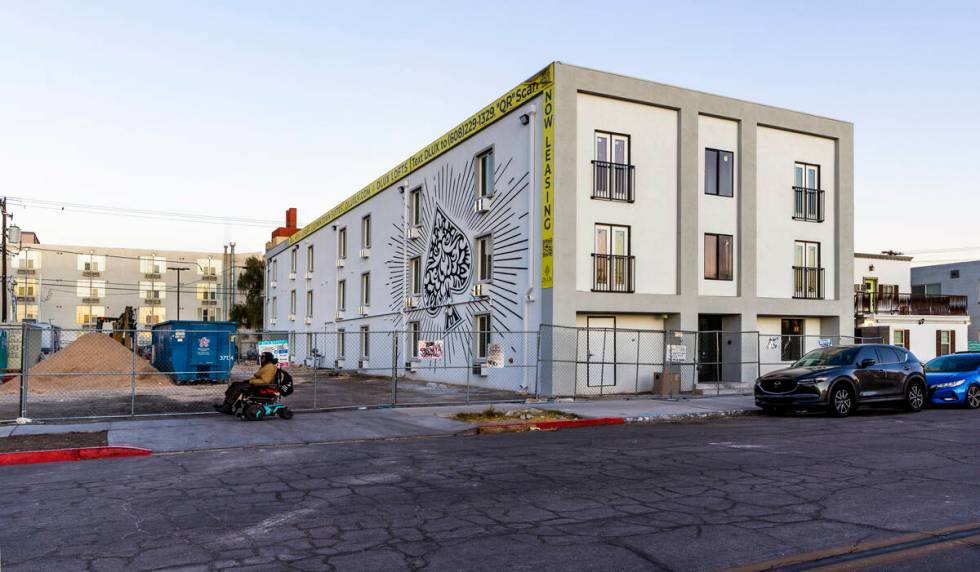 Morning light begins to illuminate the former Alpine Motel now under redevelopment and renamed ...