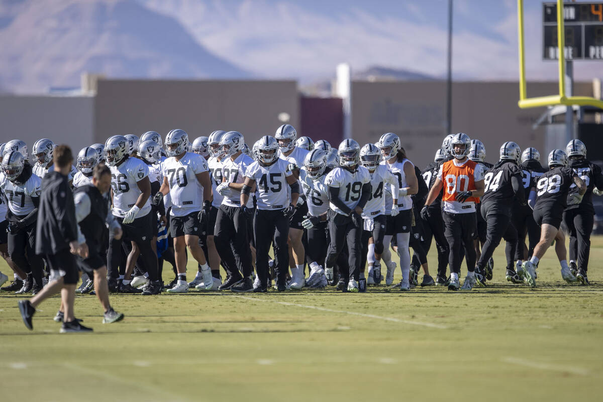 The Raiders break after a team huddle during practice at the Intermountain Healthcare Performan ...