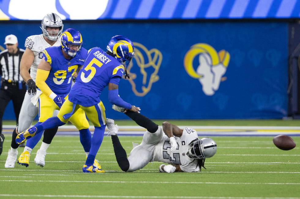 Los Angeles Rams cornerback Jalen Ramsey (5) defends a pass intended for Raiders wide receiver ...