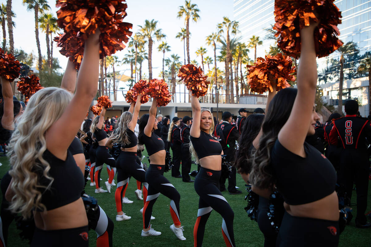 The Oregon State University cheer team perform for fans during a pep rally for the University o ...