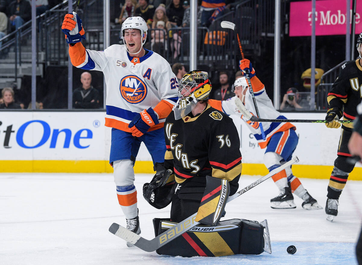 New York Islanders center Brock Nelson (29) celebrates after Islanders left wing Anders Lee sco ...