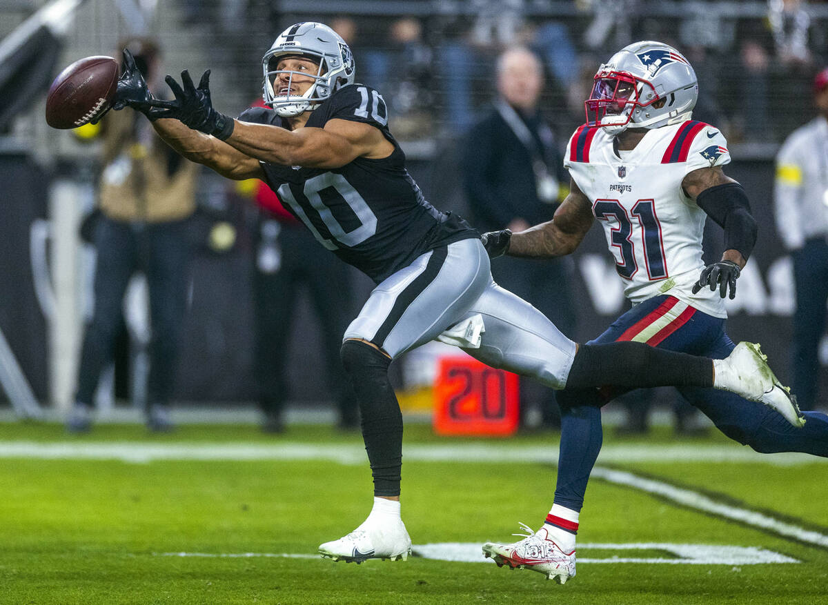 Raiders wide receiver Mack Hollins (10) extends but just can catch a log pass with New England ...