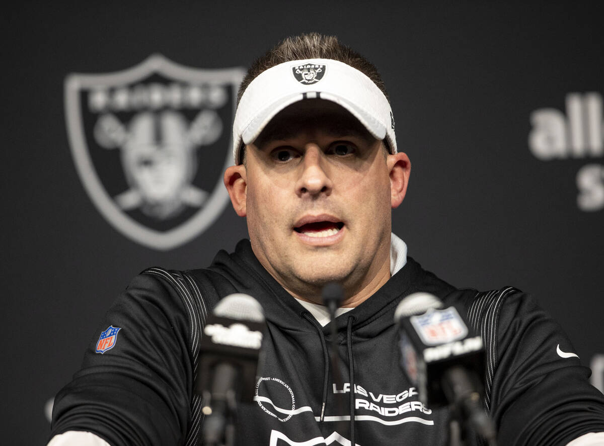 Raiders head coach Josh McDaniels speaks to media during his post-game news conference after wi ...