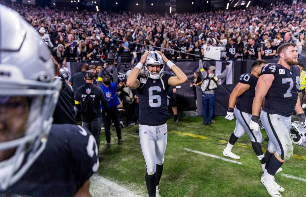 Raiders punter AJ Cole (6) and teammates celebrate their win over the New England Patriots foll ...