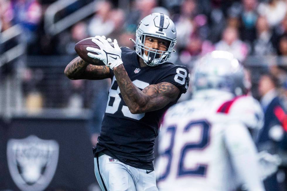 Raiders tight end Darren Waller (83) secures a touchdown catch versus the New England Patriots ...