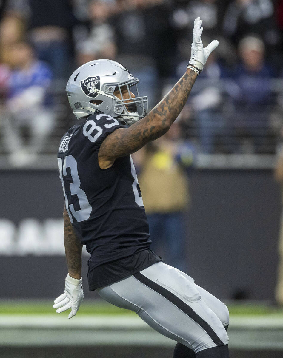 Raiders tight end Darren Waller (83) celebrates a touchdown catch versus the New England Patrio ...