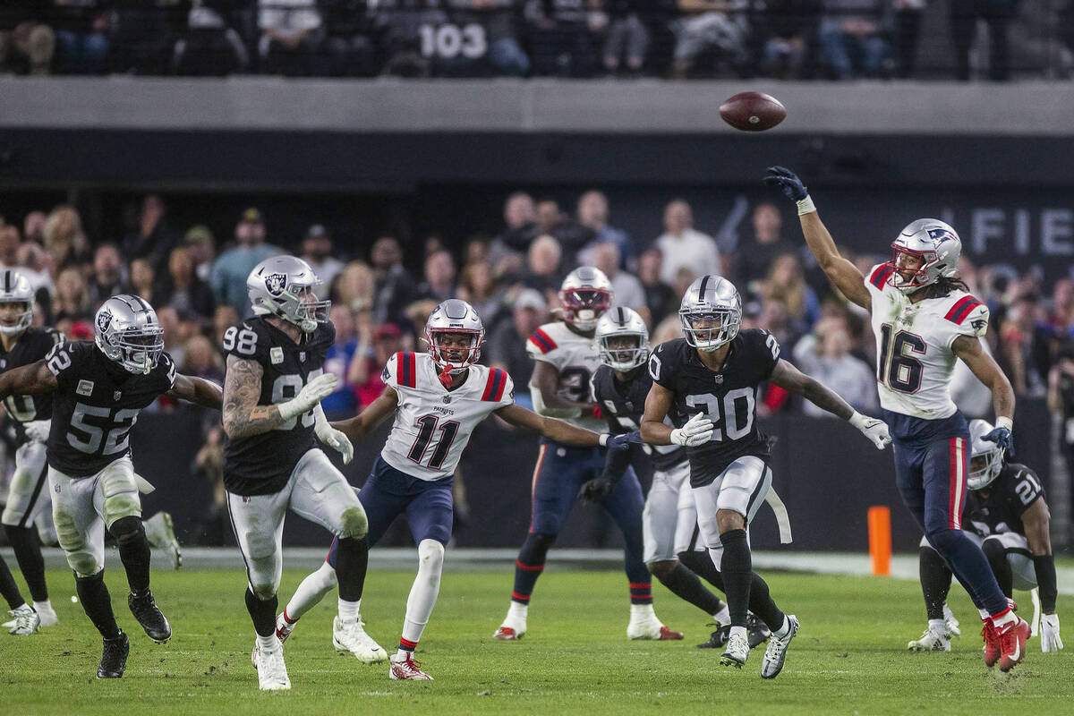 New England Patriots wide receiver Jakobi Meyers (16) laterals back the ball as time runs out v ...