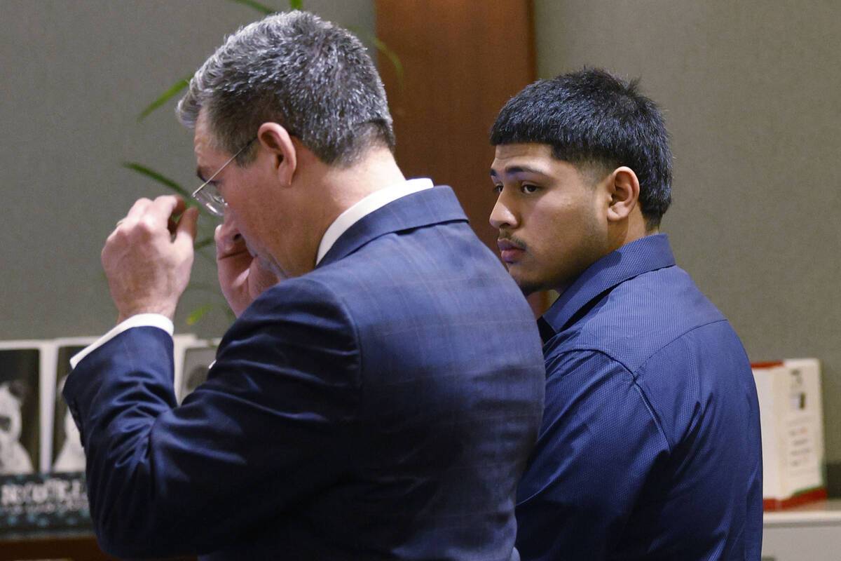 Joshua Estrada, right, stands next to his attorney John Turco while he receives his sentence fr ...