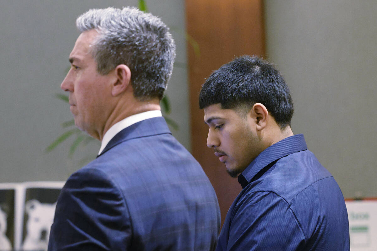 Joshua Estrada, right, stands next to his attorney John Turco while he receives his sentence fr ...