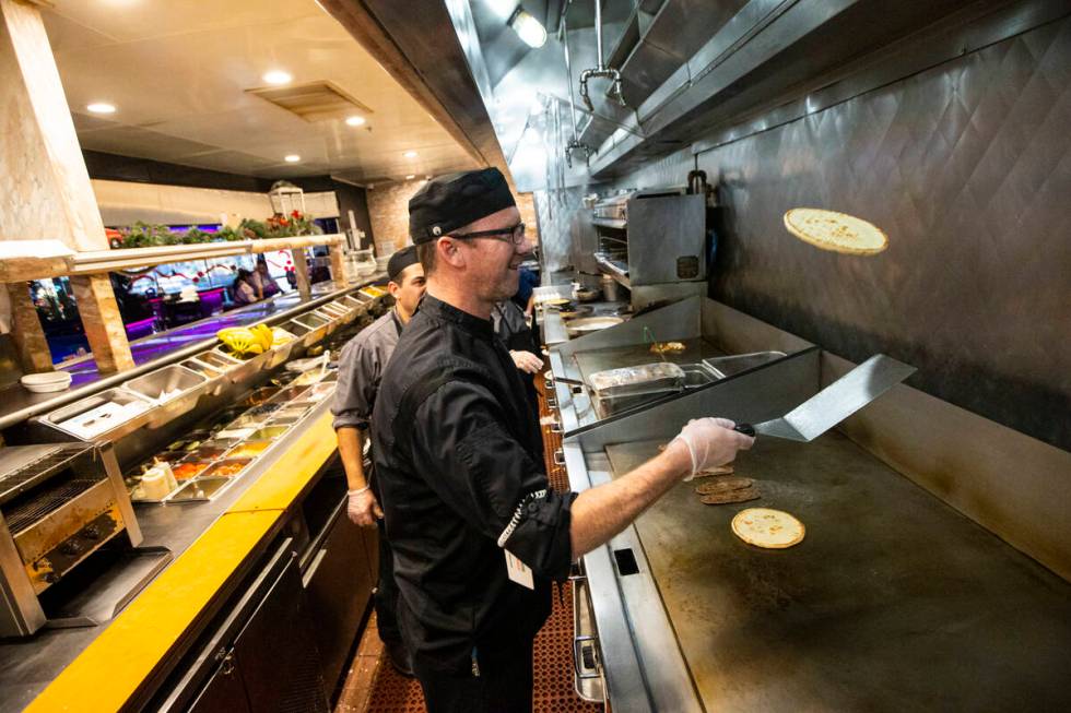 Executive Chef Nicholas Orth prepares gyros at Peppermill on Wednesday, Dec. 14, 2022, in Las V ...