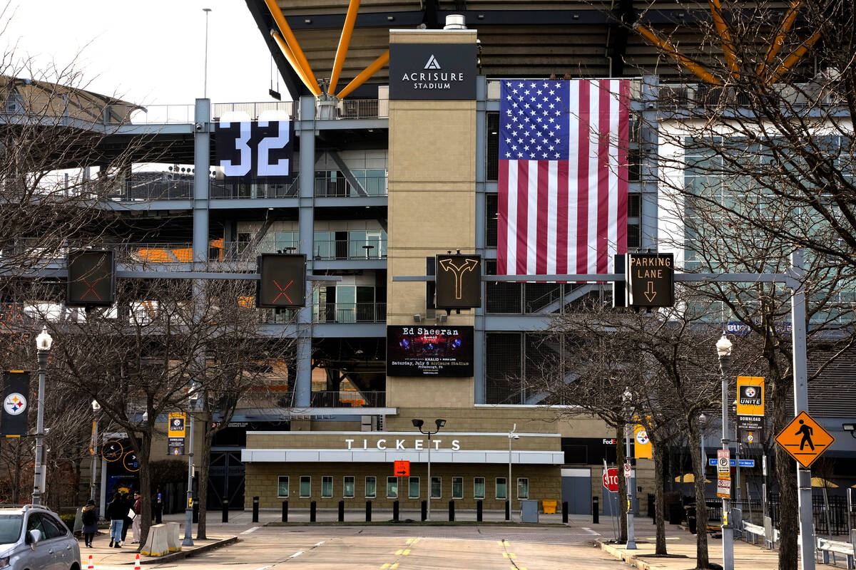 A 32, the jersey number of Pittsburgh Steelers Pro Football Hall of Famer Franco Harris, hangs ...
